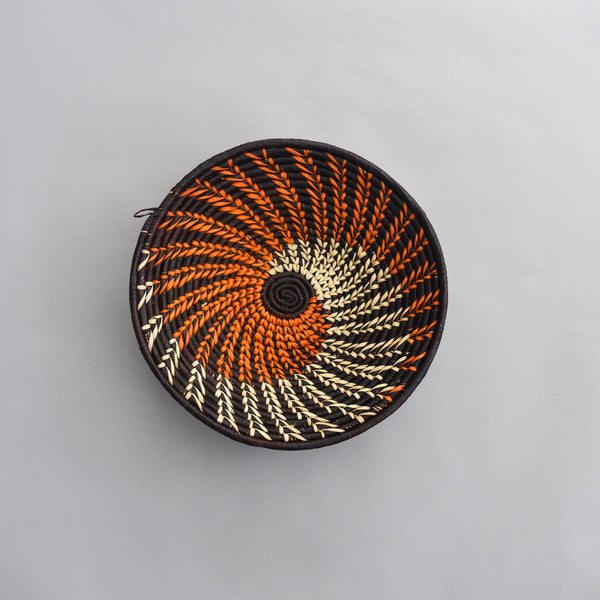 Hand woven straw. A tradition and art which has been part of Ugandan culture for centuries.  With all of the materials used being natural products or recycled, we also believe this is a lovely way of making use of natural resources the world has to offer and making positive changes to become more sustainable.  Beautifully, unique, handmade basket made out of banana stalks and raffia fibres also known as the Ugandan basket.