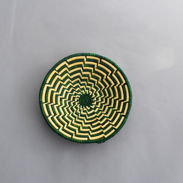 Hand woven straw. A tradition and art which has been part of Ugandan culture for centuries.  With all of the materials used being natural products or recycled, we also believe this is a lovely way of making use of natural resources the world has to offer and making positive changes to become more sustainable.  Beautifully, unique, handmade basket made out of banana stalks and raffia fibres also known as the Ugandan basket.