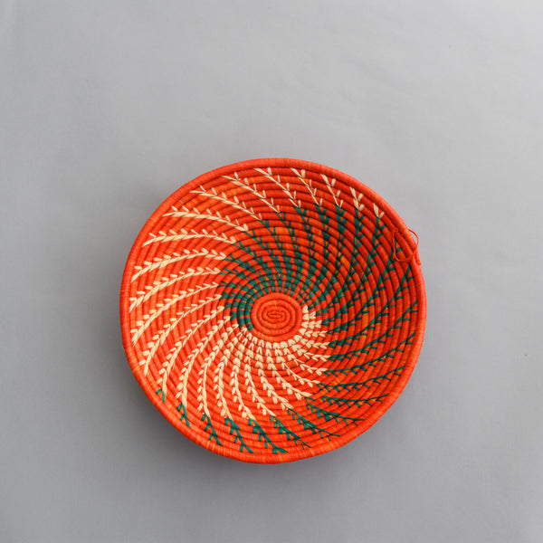 Hand woven straw. A tradition and art which has been part of Ugandan culture for centuries.  With all of the materials used being natural products or recycled, we also believe this is a lovely way of making use of natural resources the world has to offer and making positive changes to become more sustainable.  Beautifully, unique, handmade basket made out of banana stalks and raffia fibres also known as the Ugandan basket.