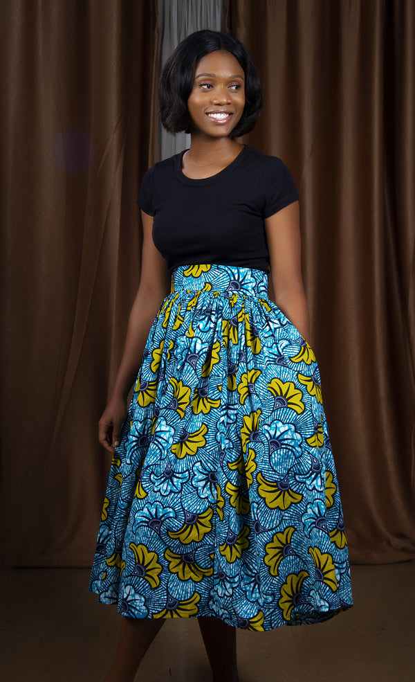 A full flare maxi colourful print Ankara high waist skirt with pockets.  This skirt is made from 100…